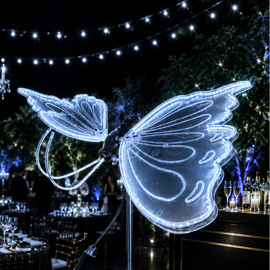 DETALLE PARA DECORACION DE EVENTOS ,LUZ PLASTICO BLANCA CON BASE MARIPOSA